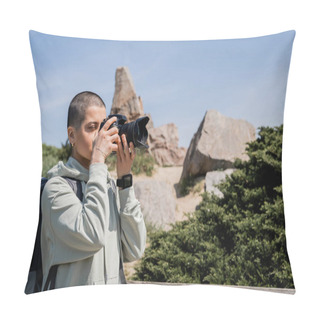 Personality  Young Short Haired And Tattooed Female Tourist With Backpack And Map Taking Photo On Digital Camera While Standing With Nature At Background, Translation Of Tattoo: Love Pillow Covers