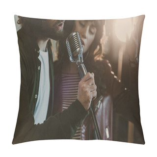 Personality  Close-up Shot Of Young Couple Performing Song With Vintage Microphone Pillow Covers