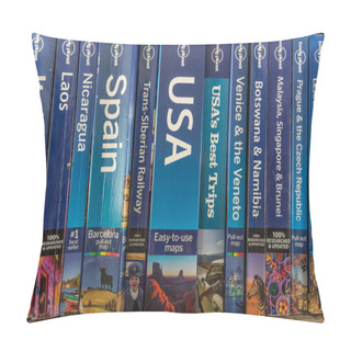 Personality  Antwerp, Belgium, September 2019, Illustrative Editorial: Bunch Of Used Lonely Planet Travel Guide Books In A Row Pillow Covers