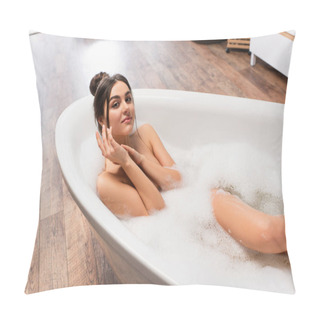 Personality  High Angle View Of Cheerful Woman With Hair Bun Looking At Camera While Taking Bath In Bathtub  Pillow Covers