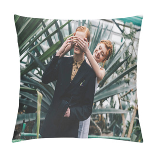 Personality  Smiling Redhead Girl In White Dress Closing Eyes To Young Man In Botanical Garden Pillow Covers