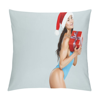 Personality  Side View Of Sexy Sportive Woman In Blue Swimsuit And Christmas Hat Posing With Gift Isolated On Grey Pillow Covers