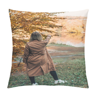 Personality  Back View Of Woman Standing In Coat And Pointing At Lake In Autumn Forest  Pillow Covers