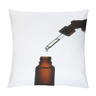Personality  Cropped Shot Of Woman Dropping Oil Into Bottle From Pipette On White Pillow Covers