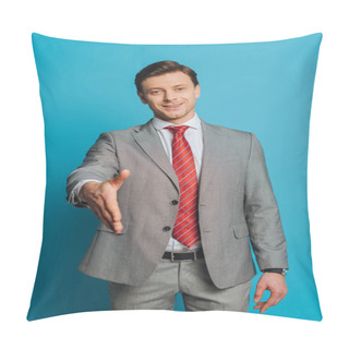 Personality  Smiling Businessman Showing Greeting Gesture With Outstretched Hand While Looking At Camera On Blue Background Pillow Covers