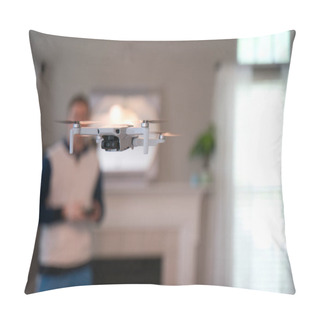 Personality  Drone Flying Indoors With Pilot Visible In Background. Amateur Drone Flight. User Wearing Sweatshirt Flying Drone Inside Of Home On Cold Day. White Drone Flying Inside. Pillow Covers