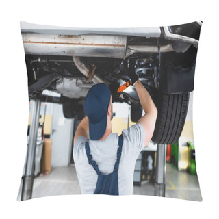 Personality  Back View Of Mechanic In Cap Holding Flashlight And Repairing Car In Service Station  Pillow Covers