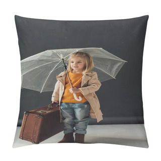 Personality  Child In Trench Coat And Jeans Holding Umbrella And Leather Suitcase On Black Background Pillow Covers