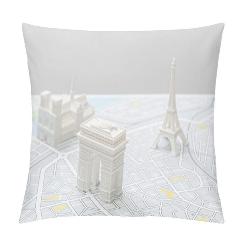 Personality  selective focus of small figurines on map of paris isolated on grey   pillow covers