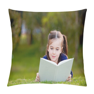 Personality  A Little Girl Enjoying Reading Outdoors On The Grass Pillow Covers