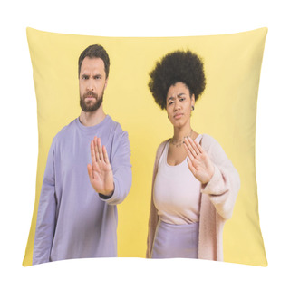 Personality  Displeased And Frowning Multiethnic Couple Looking At Camera And Showing Refuse Gesture Isolated On Yellow Pillow Covers