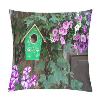 Personality  A Green Birdhouse Hangs On A Tree Surrounded By Petunia Flowers. Pillow Covers