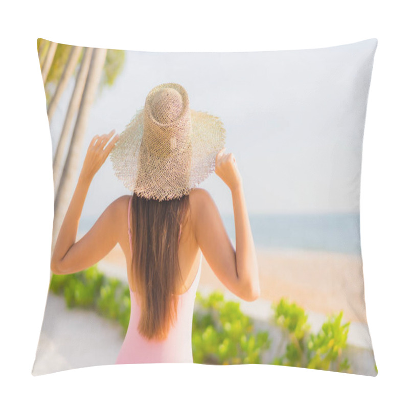 Personality  Portrait beautiful young asian woman relax leisure around outdoor swimming pool with sea beach ocean view in vacation travel pillow covers