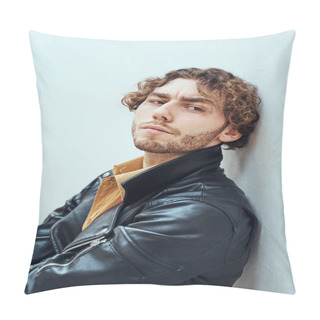Personality  Hot And Assertive, Young Male Model Posing In A Studio For The Photoshoot Wearing Fashionable Leather Coat, Looking Assertive While Leaning On The Wall Pillow Covers