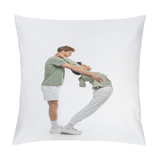 Personality  Side View Of Interracial Couple Showing D Letter With Bodies On White Background  Pillow Covers