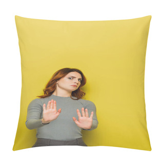 Personality  Displeased Woman With Wavy Hair Showing Stop Gesture And Looking At Camera On Yellow Pillow Covers