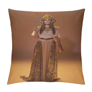 Personality  Full Length Of Stylish Woman In Egyptian Attire Holding Crook And Standing On Brown Background Pillow Covers