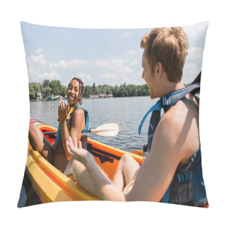 Personality  Pretty And Smiling African American Woman In Life Vest Looking At Blurred Redhead Man While Sailing In Sportive Kayak On River With Green Bank On Weekend In Summer Pillow Covers