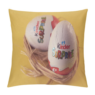 Personality  TURKU, FINLAND - FEBRUARY 25, 2021: Kinder Surprise Chocolate Eggs With A Toy In A Nest On A Yellow Background. Easter Concept. Pillow Covers