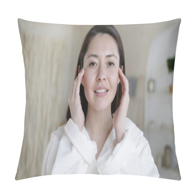 Personality  Attractive multi ethnic lady looking in mirror touching healthy soft face skin in bathroom. Young mixed race asian woman doing massage satisfied with facial procedures skincare concept. pillow covers