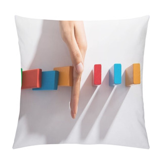 Personality  Close-up Of Businessperson Hand Stopping Colorful Blocks From Falling On Table In Office Pillow Covers