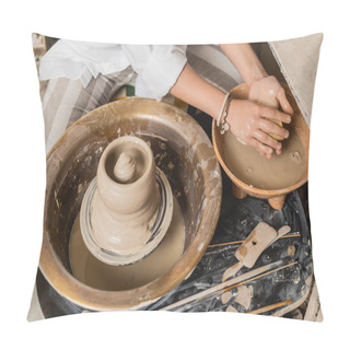 Personality  Top View Of Young Female Artisan In Workwear Holding Sponge Near Bowl With Water And Wet Clay On Pottery Wheel While Working In Ceramic Workshop, Pottery Studio Workspace And Craft Concept Pillow Covers