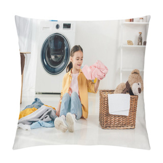 Personality  Child In Yellow Shirt And Jeans Sitting And Putting Clothes To Basket In Laundry Room Pillow Covers