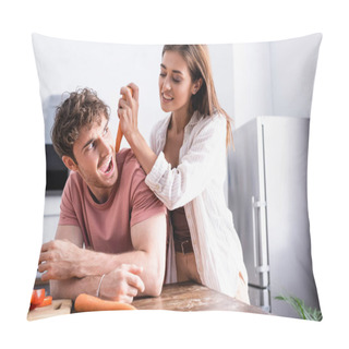 Personality  Smiling Woman Holding Carrot Near Excited Boyfriend In Kitchen  Pillow Covers