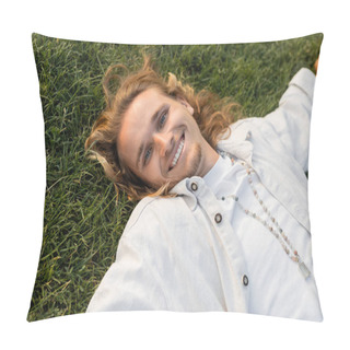 Personality  High Angle View Of Cheerful Young Man In White Linen Shirt Lying On Green Lawn And Smiling At Camera Pillow Covers