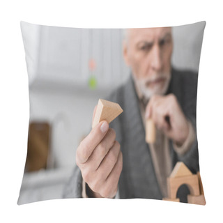 Personality  Selective Focus Of Wooden Block In Hand Of Senior Man With Alzheimer Syndrome On Blurred Background Pillow Covers
