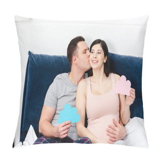 Personality  Happy Young Pregnant Couple Holding Blue And Pink Clouds Symbols And Kissing On Bed Pillow Covers
