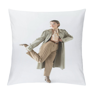 Personality  Full Length Of Trendy Woman In Glasses, Trench Coat And Scarf Posing On White Pillow Covers