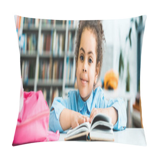 Personality  Panoramic Shot Of Happy African American Kid Sitting Near Book In Library  Pillow Covers