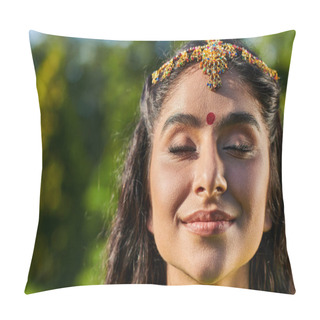 Personality  Portrait Of Smiling Indian Woman With Bindi And Matha Patti Standing With Closed Eyes Outdoors Pillow Covers