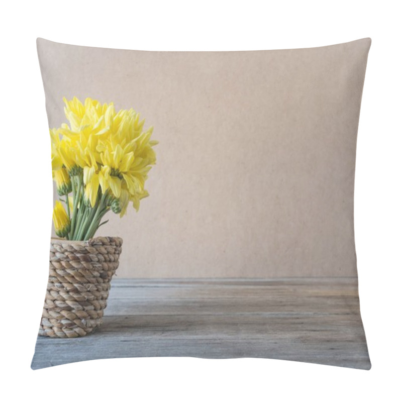 Personality  Yellow flower in vase made from bamboo on wooden table, pillow covers