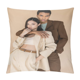 Personality  Trendy African American Man Embracing Asian Woman In Pantsuit And Looking At Camera Isolated On Beige Pillow Covers