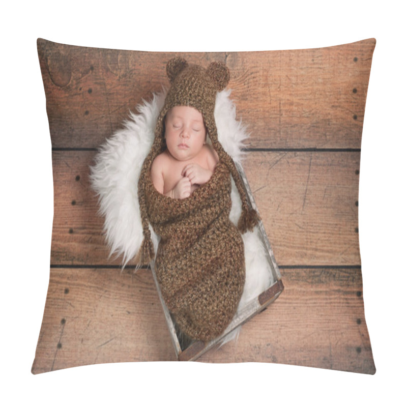 Personality  Newborn baby boy wearing a brown crocheted bear hat and sleeping in a vintage wooden box. pillow covers