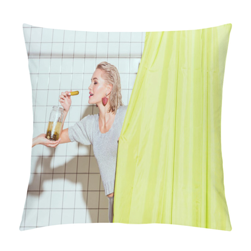 Personality  beautiful stylish woman taking pickled cucumber from glass jar in shower pillow covers