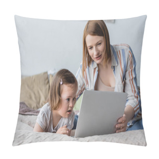 Personality  Baby With Down Syndrome Looking At Laptop Near Blurred Mother In Bedroom  Pillow Covers