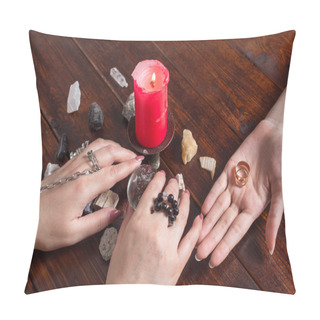 Personality  A Gypsy Woman Performs A Love Spell. A Clairvoyant Palmist Reads By Hand With A Candle. A Fortune Teller Predicts The Fate Of Love With Wedding Rings, A Magic Ball, Lighted Candles And Magic Stones. Pillow Covers