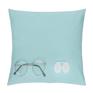 Personality  Top View Of Eyeglasses And Contact Lenses Container On Blue Background Pillow Covers