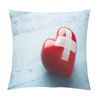 Personality  Red Heart With Adhesive Bandage On Blue Wooden Table Pillow Covers