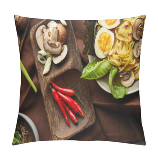 Personality  Top View Of Traditional Spicy Ramen In Bowls With Ingredients On Brown Napkin On Stone Surface Pillow Covers