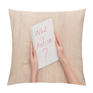 Personality  Cropped View Of Woman Holding Notebook With What Is Autism Question On Wooden Table Pillow Covers