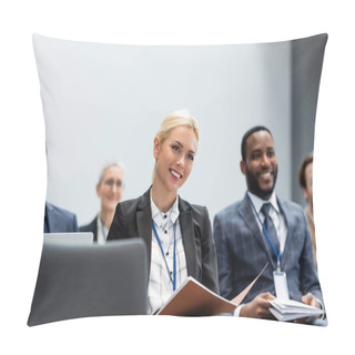 Personality  Cheerful Businesswoman With Paper Folder Sitting Near Multiethnic Colleagues During Seminar  Pillow Covers