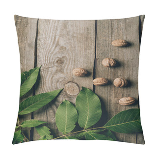 Personality  Top View Of Whole Organic Walnuts And Green Leaves On Wooden Table Pillow Covers