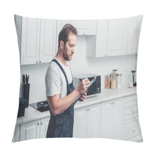 Personality  Adult Repairman In Working Writing In Clipboard In Kitchen At Home Pillow Covers