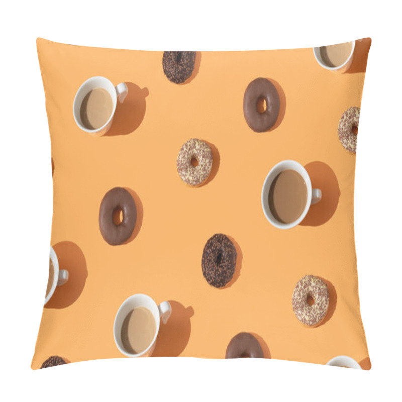 Personality  Creative food concept made of chocolate donuts, coffee in a white cup. Sweet dish pattern. Cakes and drinks on an orange background. From above. Flat bed. pillow covers