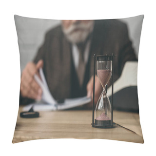 Personality  Senior Writer Working With Hourglass Standing On Foreground Pillow Covers