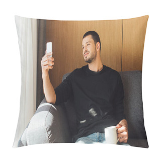 Personality  Sunlight On Handsome Man Smiling While Using Smartphone And Holding Cup In Living Room  Pillow Covers